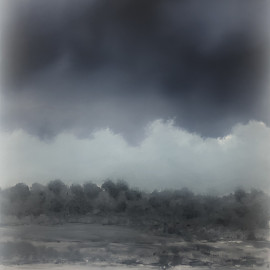 Landscape with a dark foreboding sky 