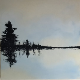 serene blue sky reflections blues and yellows tree
